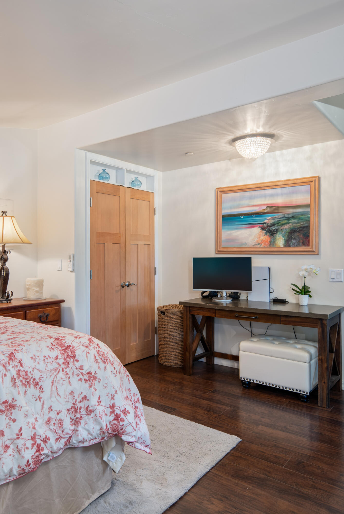 710 Ballard Canyon Road Solvang, CA 93463 - Photo 10 of 23 a bedroom with a bed and wooden floor
