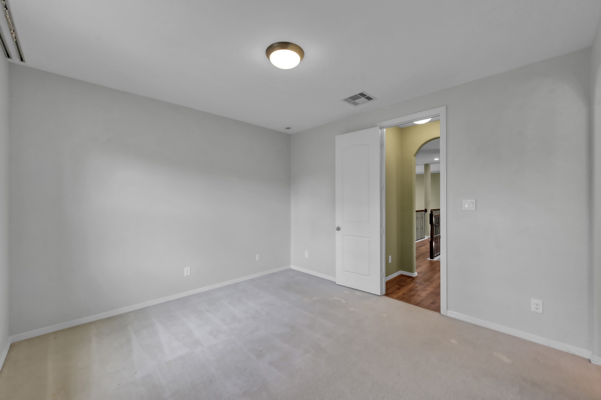 23219 Belted Kingfisher Trail Spring, TX 77389 - Photo 25 of 43 Bedroom 3 is positioned at the top of the stairs with a large walk-in closet!