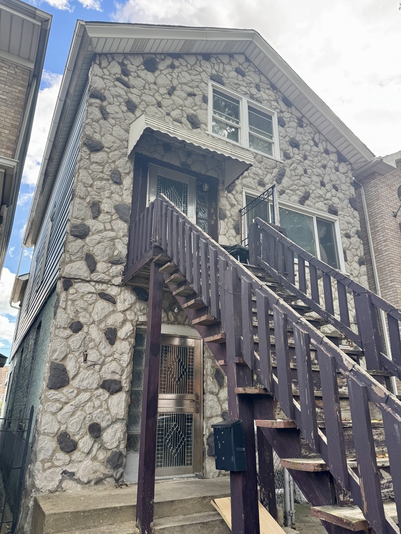 2849 South Normal Avenue Chicago, IL 60616 - Photo 2 of 2 a view of building with wooden door