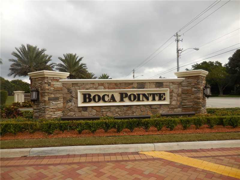 7202 Promenade Drive, Unit 202 Boca Raton, FL 33433 - Photo 35 of 35 Exterior Front. COMMUNITY ENTRY