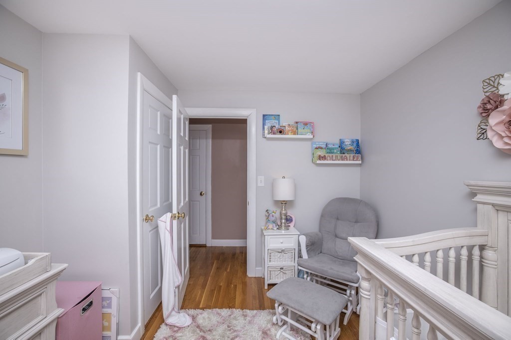 14 Old Randolph Street Canton, MA 02021 - Photo 17 of 32 a bedroom with furniture and a rug