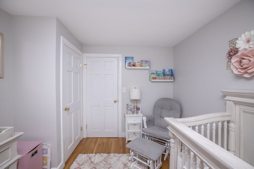 14 Old Randolph Street Canton, MA 02021 - Photo 19 of 32 a room with a bed and a chair