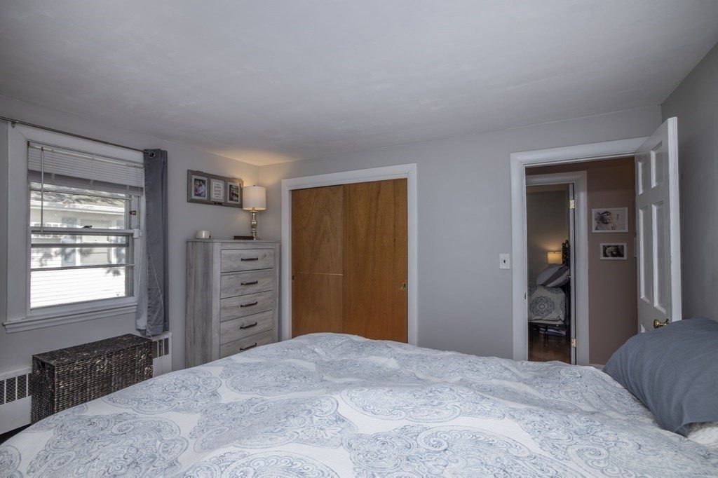 14 Old Randolph Street Canton, MA 02021 - Photo 23 of 32 a bedroom with a dresser and a window