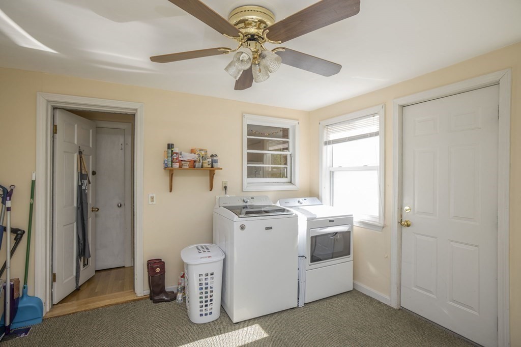 14 Old Randolph Street Canton, MA 02021 - Photo 26 of 32 a view of a livingroom with washer and dryer