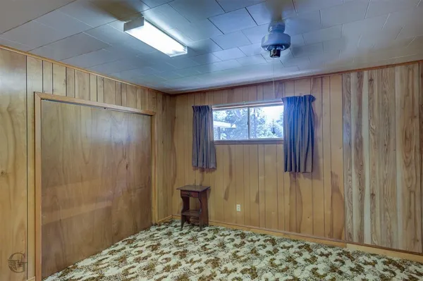 a view of a bathroom with a shower curtain