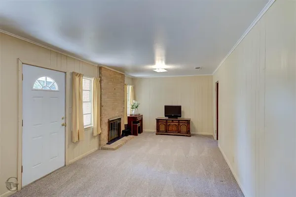 a view of livingroom with furniture and window