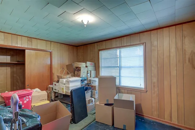 a workspace with furniture and a window