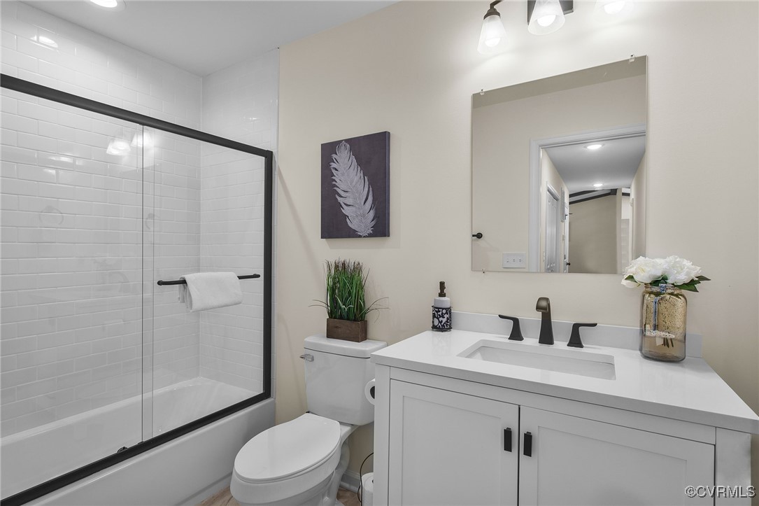 321 Johnson Mill Road Bumpass, VA 23024 - Photo 23 of 33 a bathroom with a sink a toilet and shower