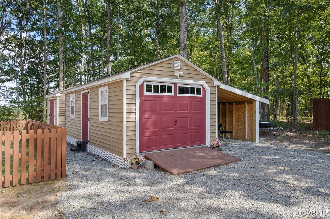 321 Johnson Mill Road Bumpass, VA 23024 - Photo 30 of 33 a front view of a house with a yard
