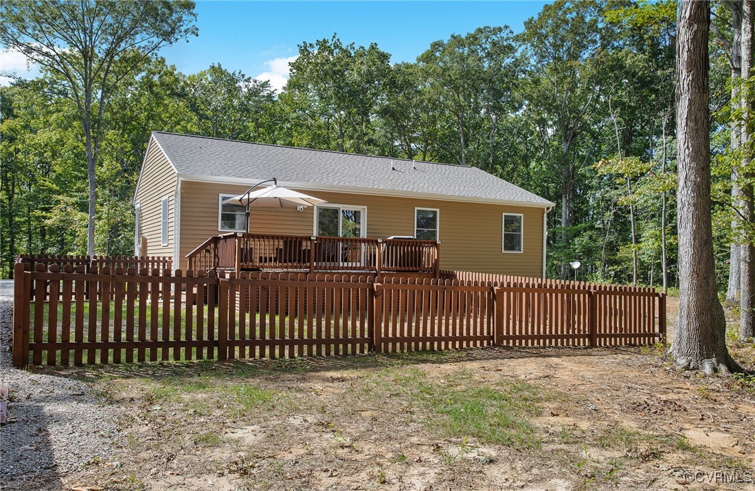 321 Johnson Mill Road Bumpass, VA 23024 - Photo 32 of 33 a front view of a house with a garden