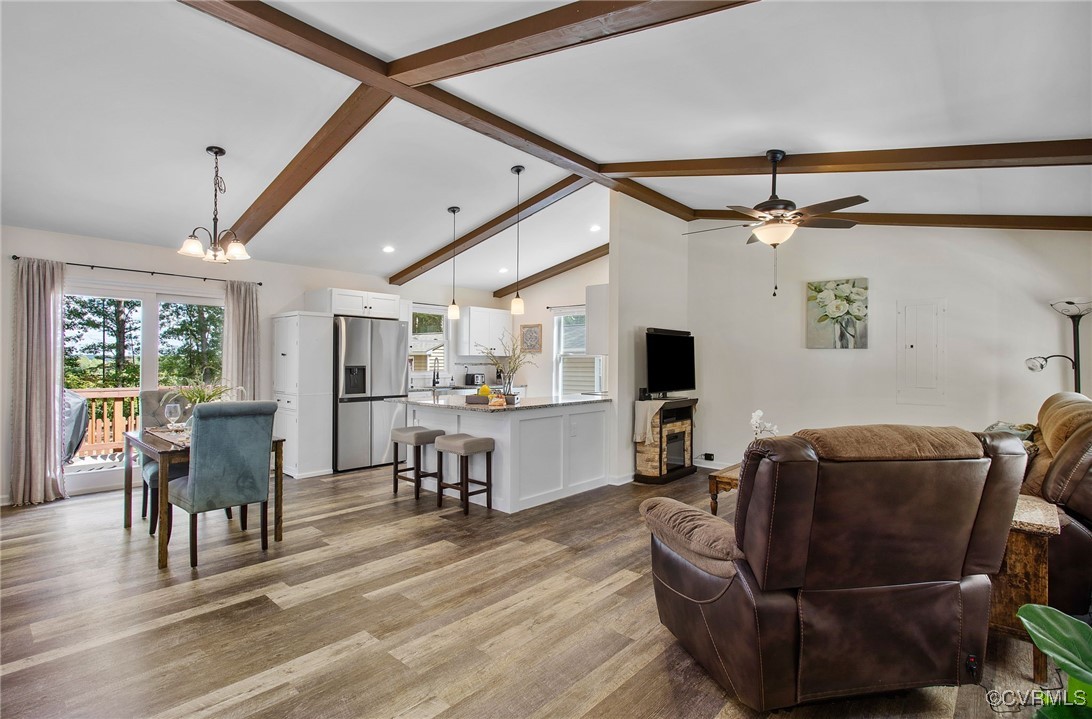 321 Johnson Mill Road Bumpass, VA 23024 - Photo 5 of 33 a living room with furniture and a wooden floor