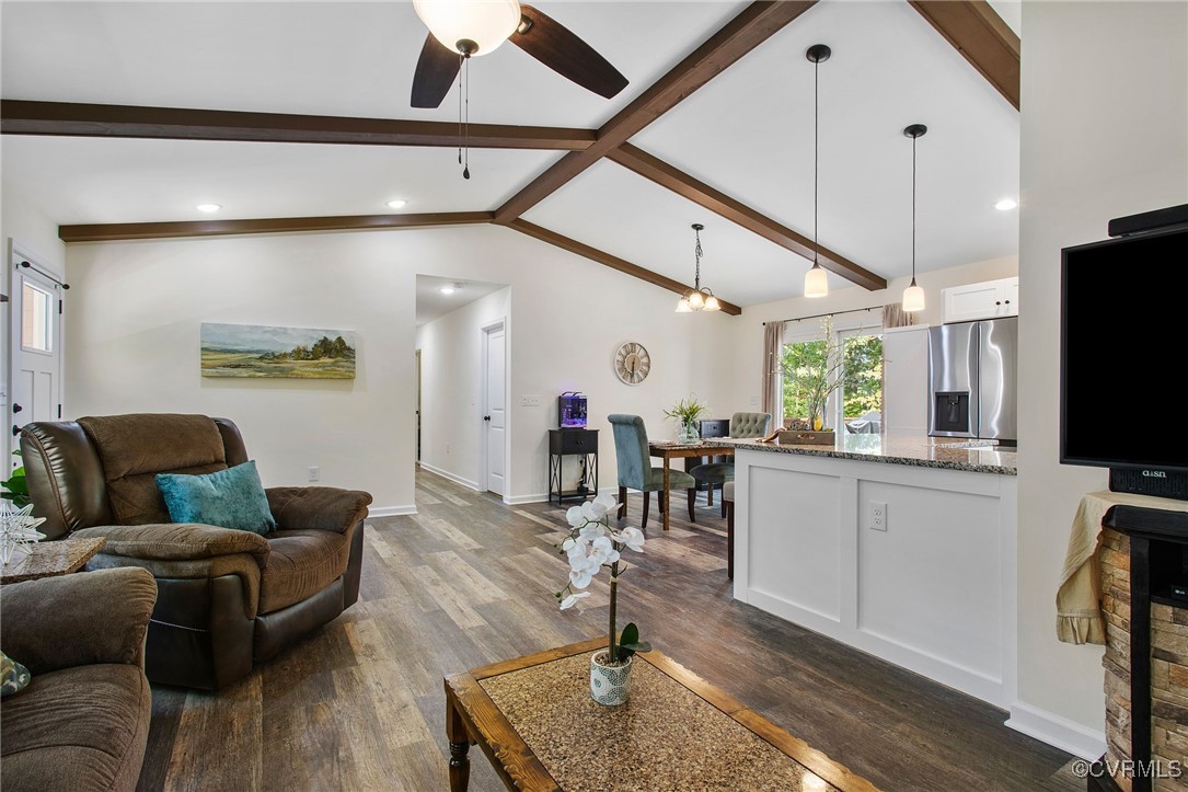 321 Johnson Mill Road Bumpass, VA 23024 - Photo 6 of 33 a living room with furniture and a flat screen tv
