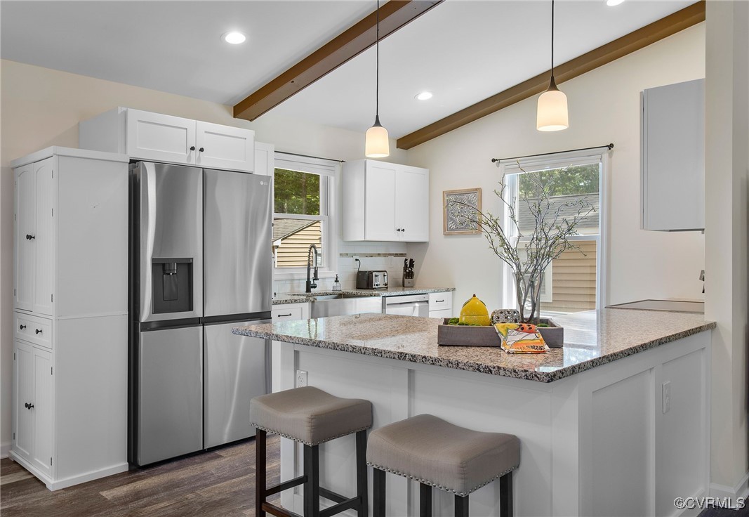 321 Johnson Mill Road Bumpass, VA 23024 - Photo 8 of 33 a kitchen with refrigerator and window
