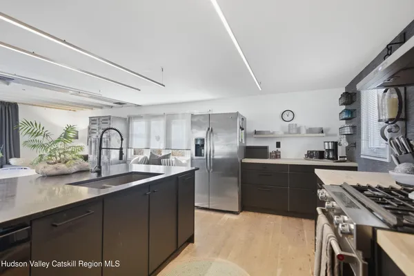 a bedroom with a bed and a table