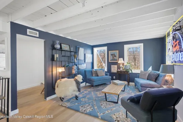 a workspace with furniture and wooden floor