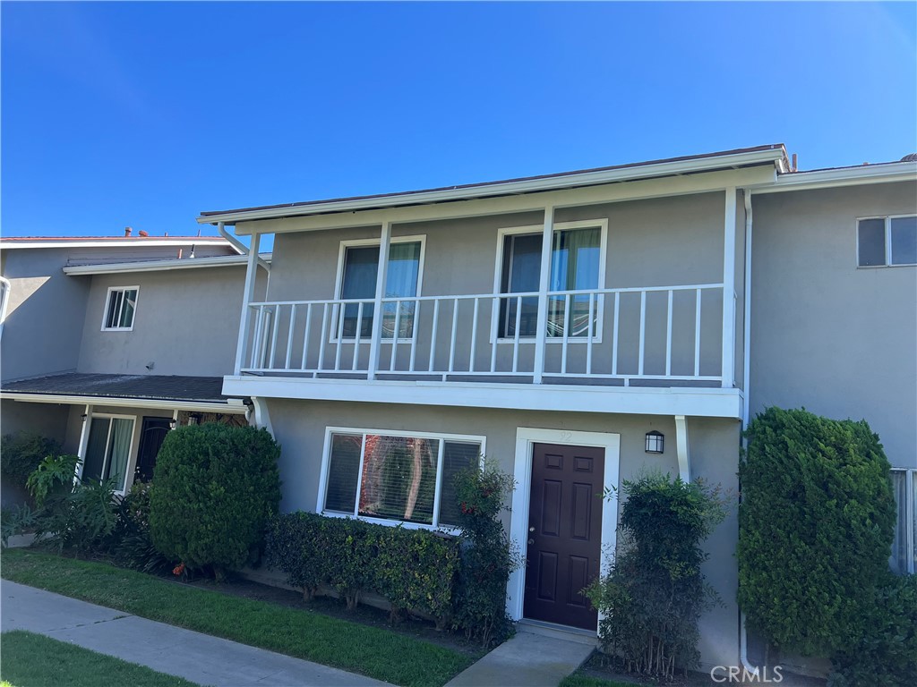 1777 Mitchell Avenue, Unit 92 Tustin, CA 92780 - Photo 1 of 13 a house view with a garden space