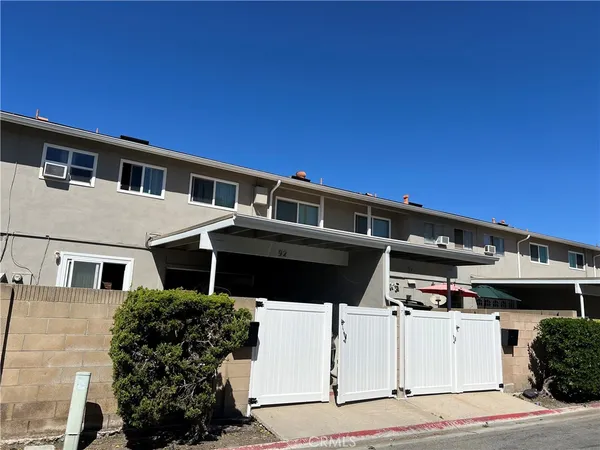 a front view of a house with a garage