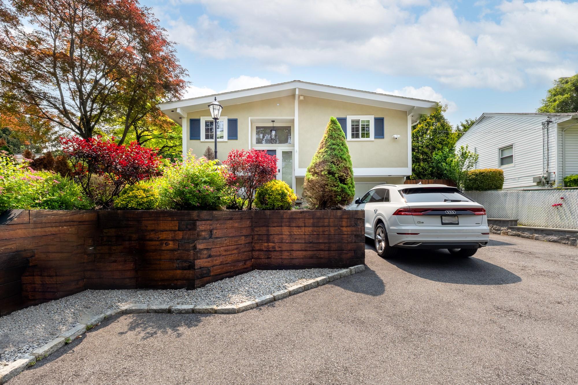 a car parked in front of a house