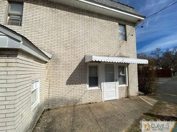 a front view of a house with a garage