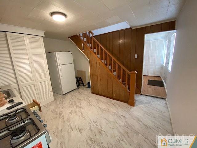 123 Kossuth Street Somerset, NJ 08873 - Photo 5 of 15 a view of a livingroom with wooden floor and stairs