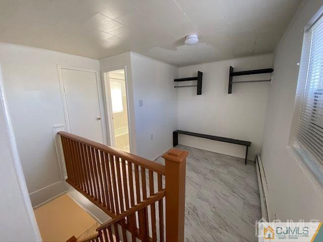 123 Kossuth Street Somerset, NJ 08873 - Photo 6 of 15 a view of entryway with stairs and wooden floor