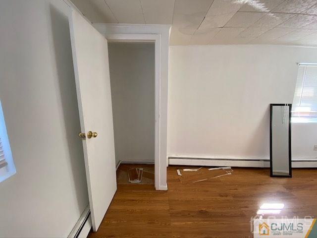 123 Kossuth Street Somerset, NJ 08873 - Photo 9 of 15 a view of a room with wooden floor