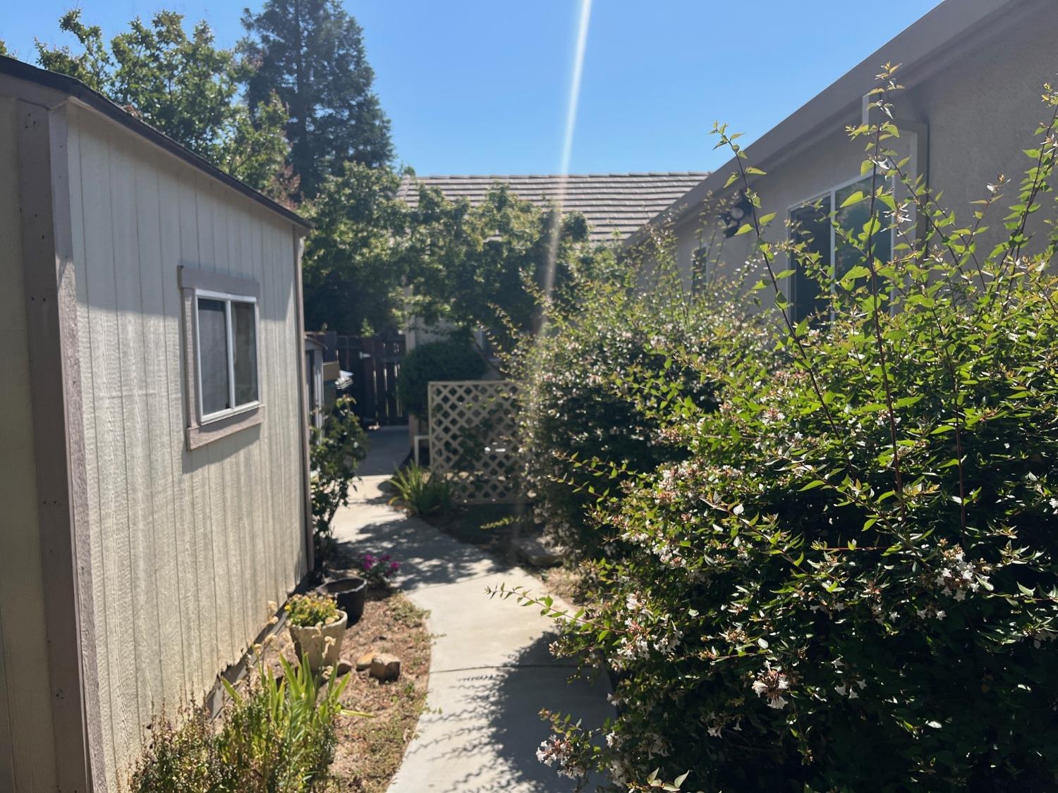 2261 Pillsbury Road Manteca, CA 95337 - Photo 14 of 15 a view of a house with a yard