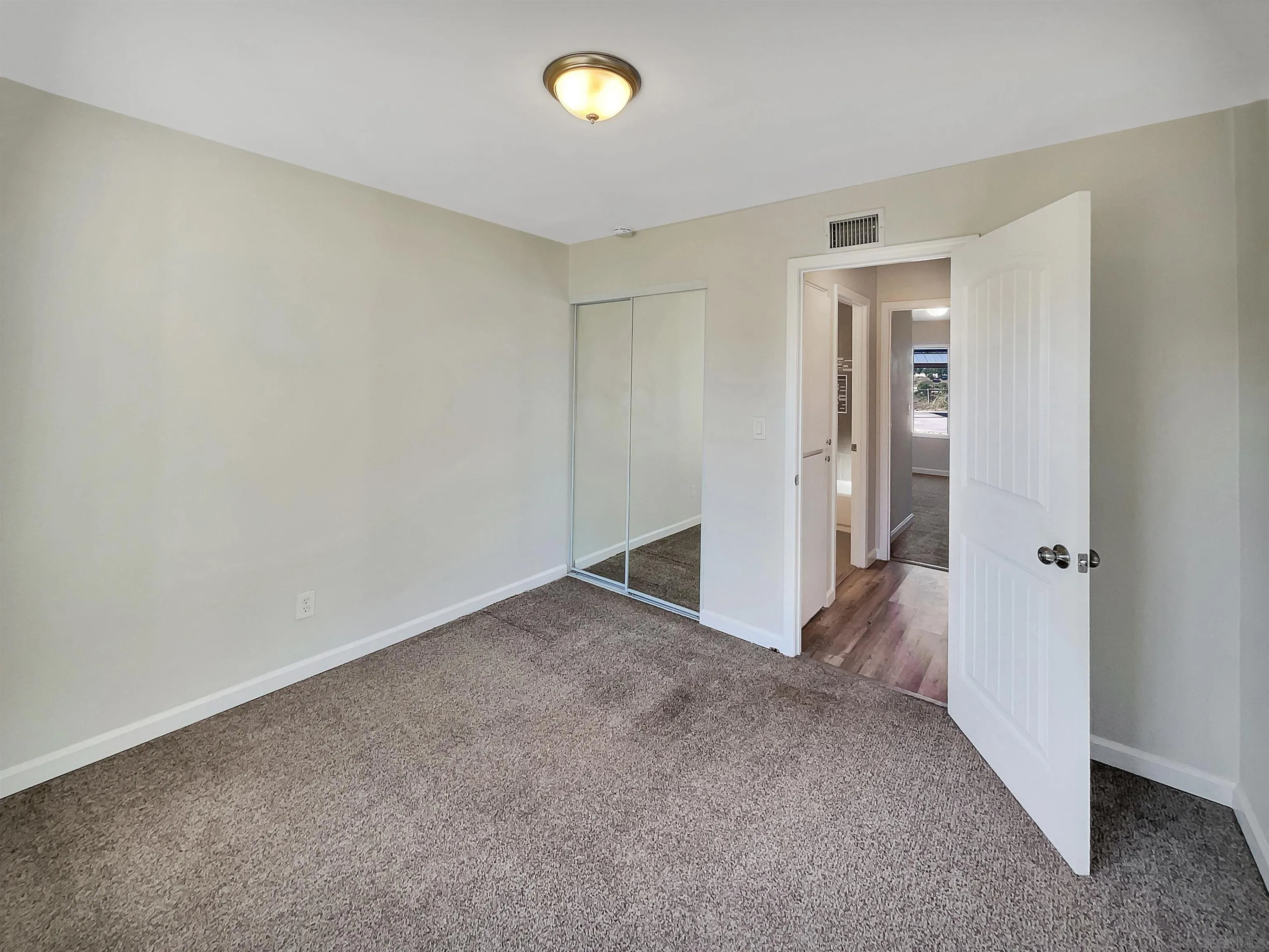 8238 Cacus Street Spring Valley, CA 91977 - Photo 14 of 22 wooden floor in an empty room