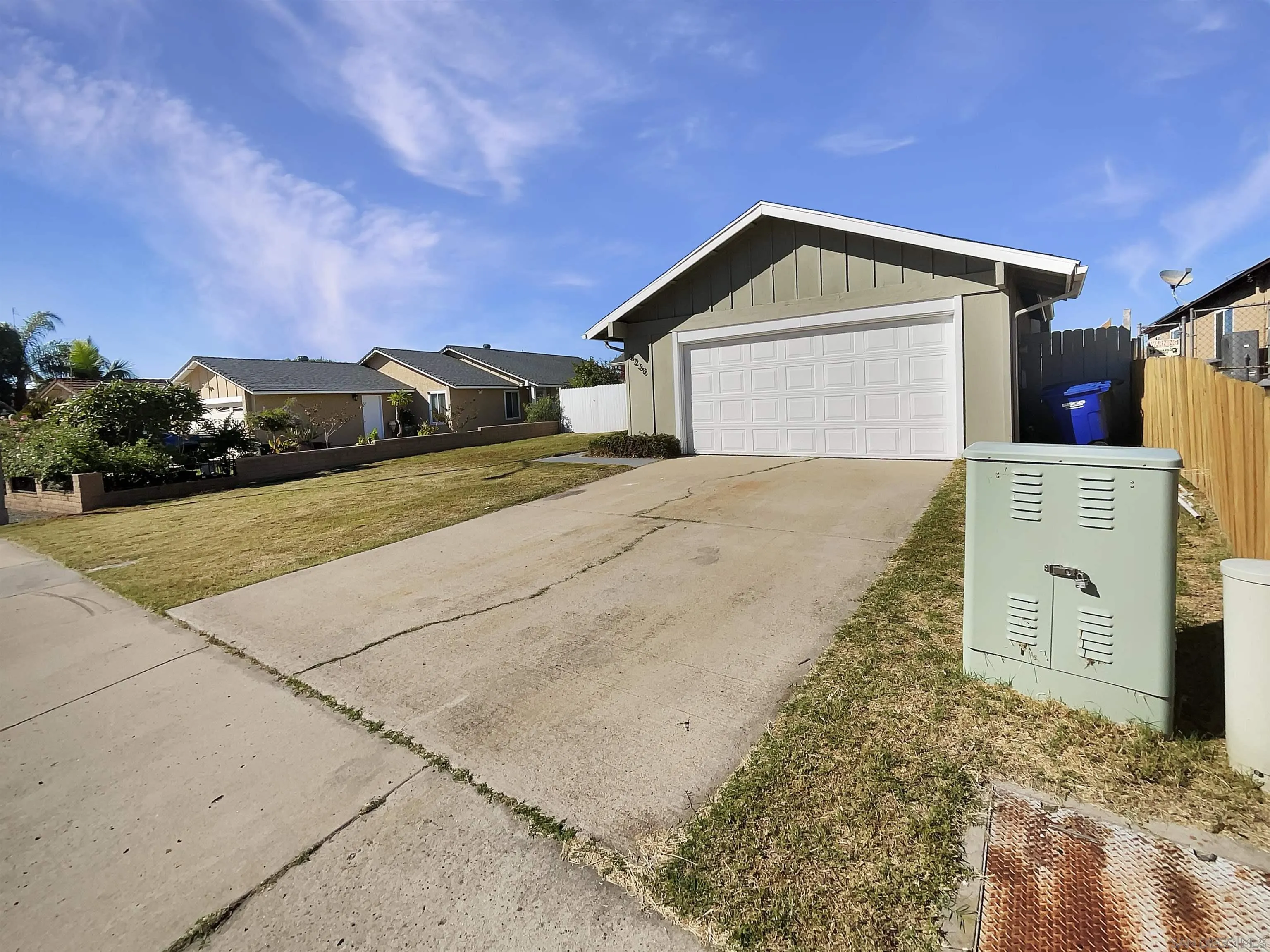 8238 Cacus Street Spring Valley, CA 91977 - Photo 7 of 22 a view of a house with a yard