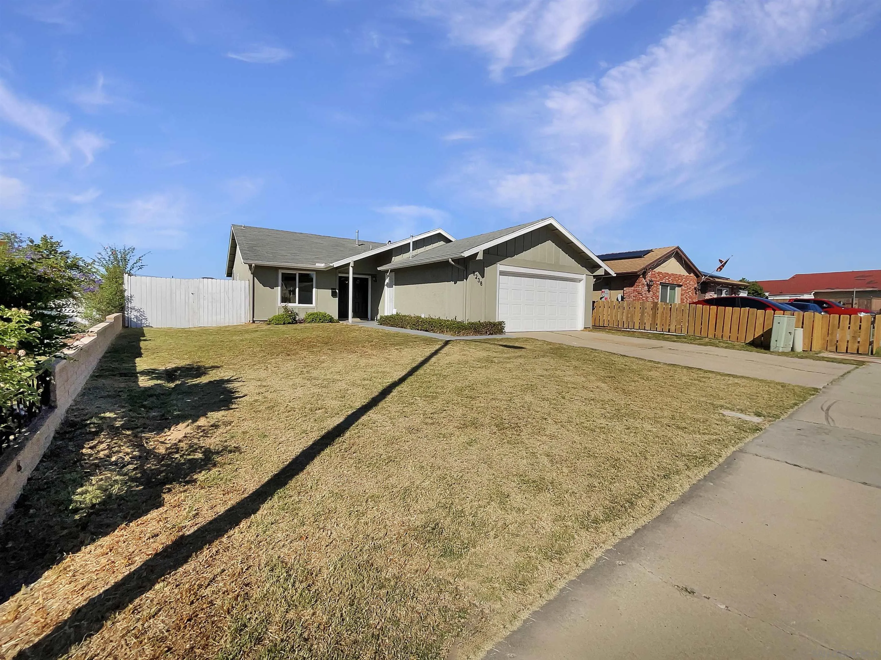 8238 Cacus Street Spring Valley, CA 91977 - Photo 8 of 22 a view of residential houses with yard
