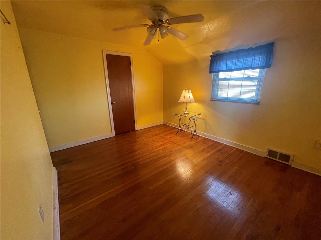 1018 Grandview Avenue Pittsburgh, PA 15237 - Photo 15 of 29 a view of an empty room with wooden floor and a window