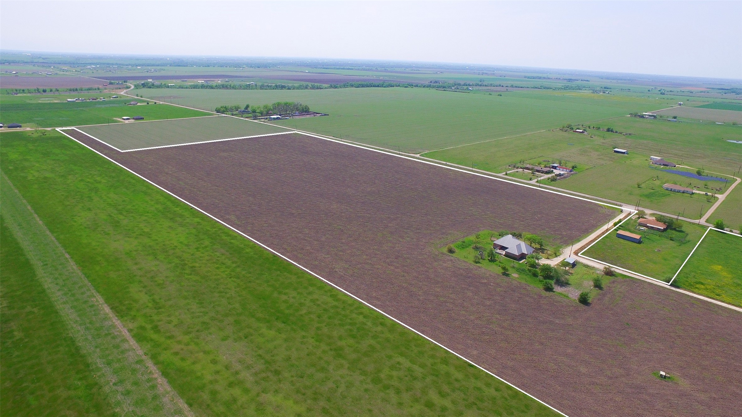 2711 County Road 406 Taylor, TX 76574 - Photo 3 of 8 a view of a field with an outdoor space