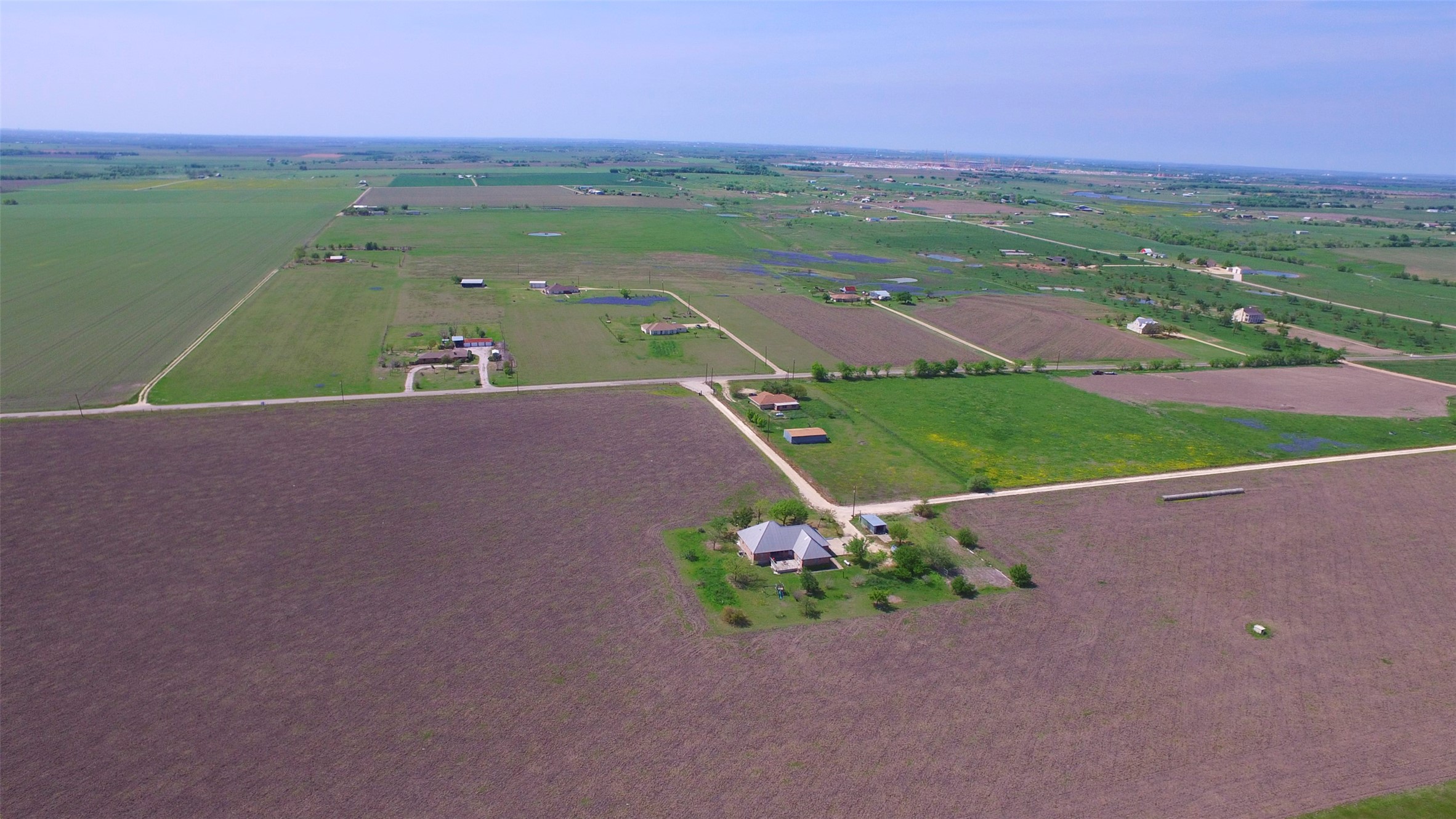 2711 County Road 406 Taylor, TX 76574 - Photo 6 of 8 an aerial view of a house with a yard