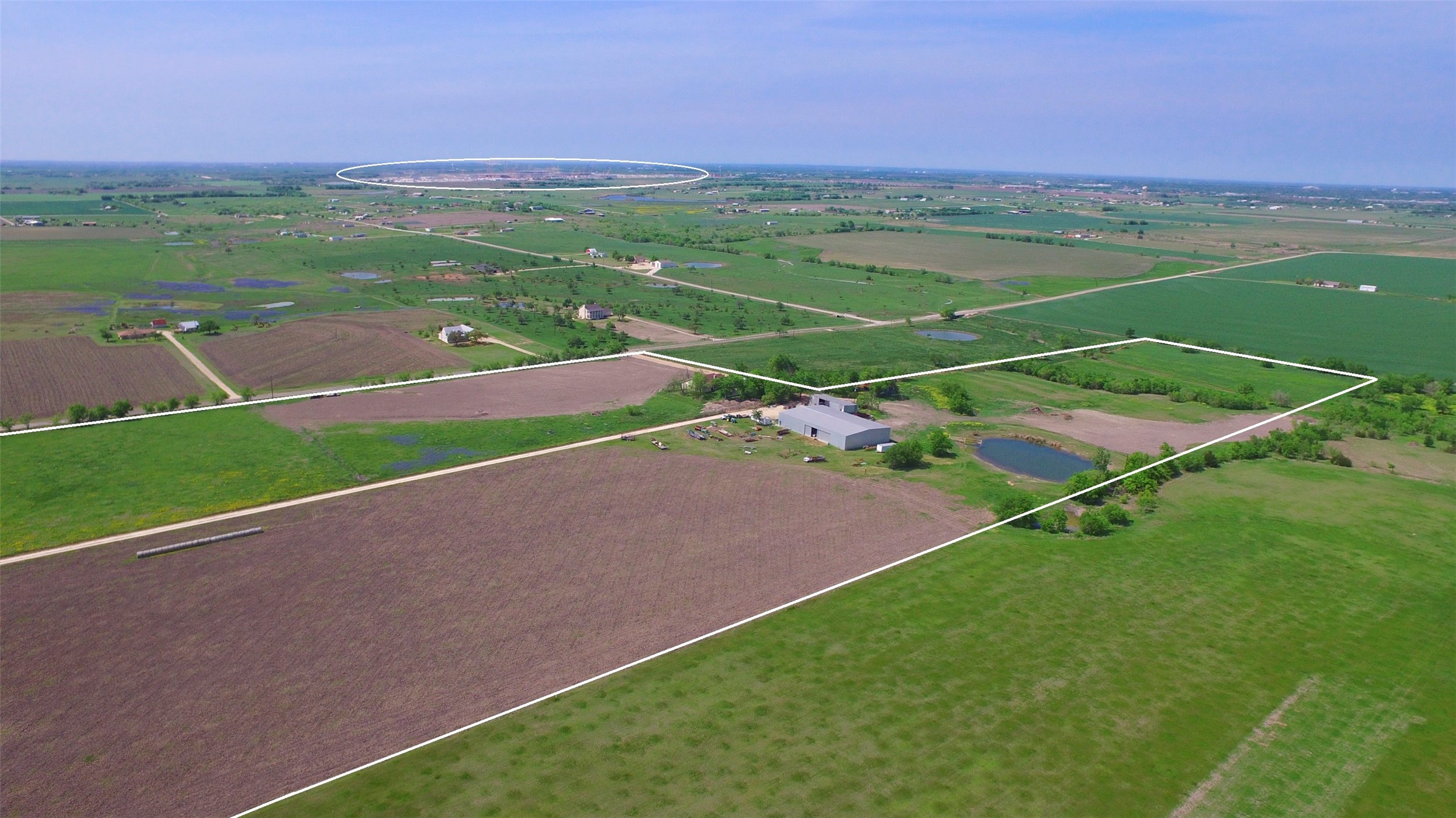 2711 County Road 406 Taylor, TX 76574 - Photo 7 of 8 a view of a field with a big yard