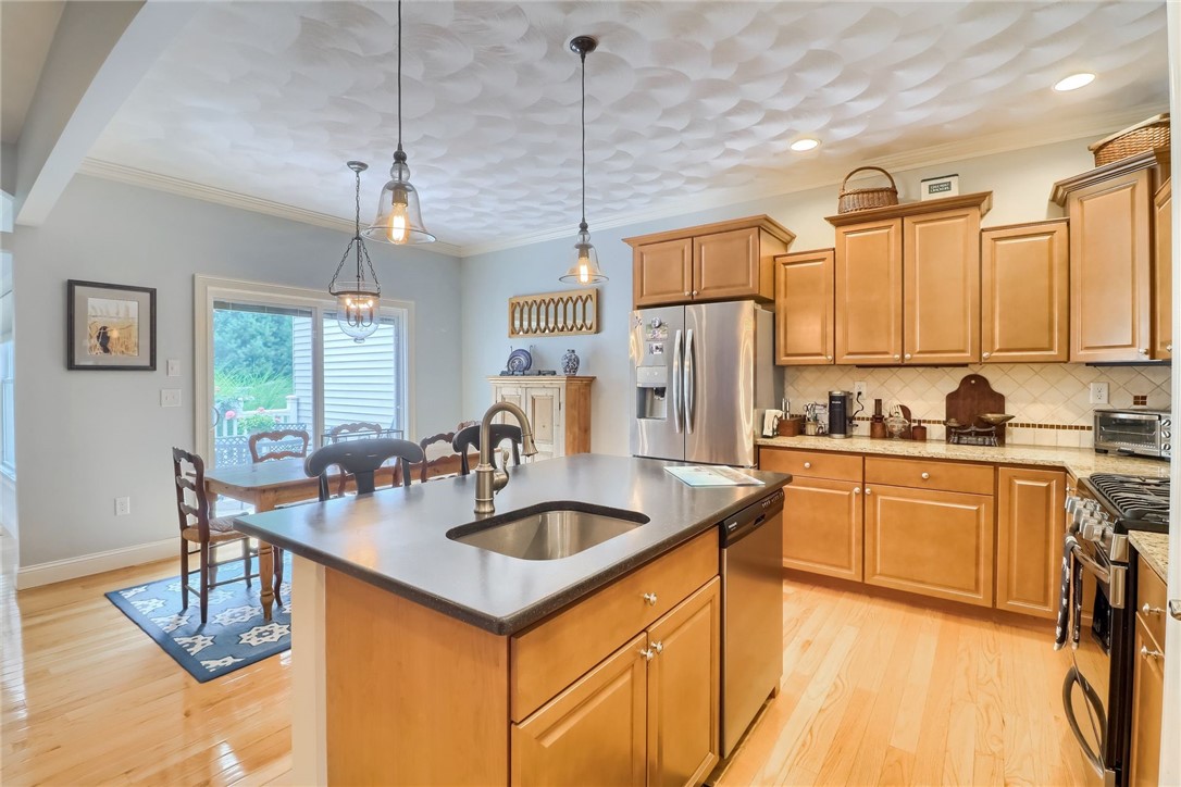 70 Whispering Pine Way, Unit 70 Exeter, RI 02822 - Photo 11 of 21 Kitchen. Notice the sliders to the deck