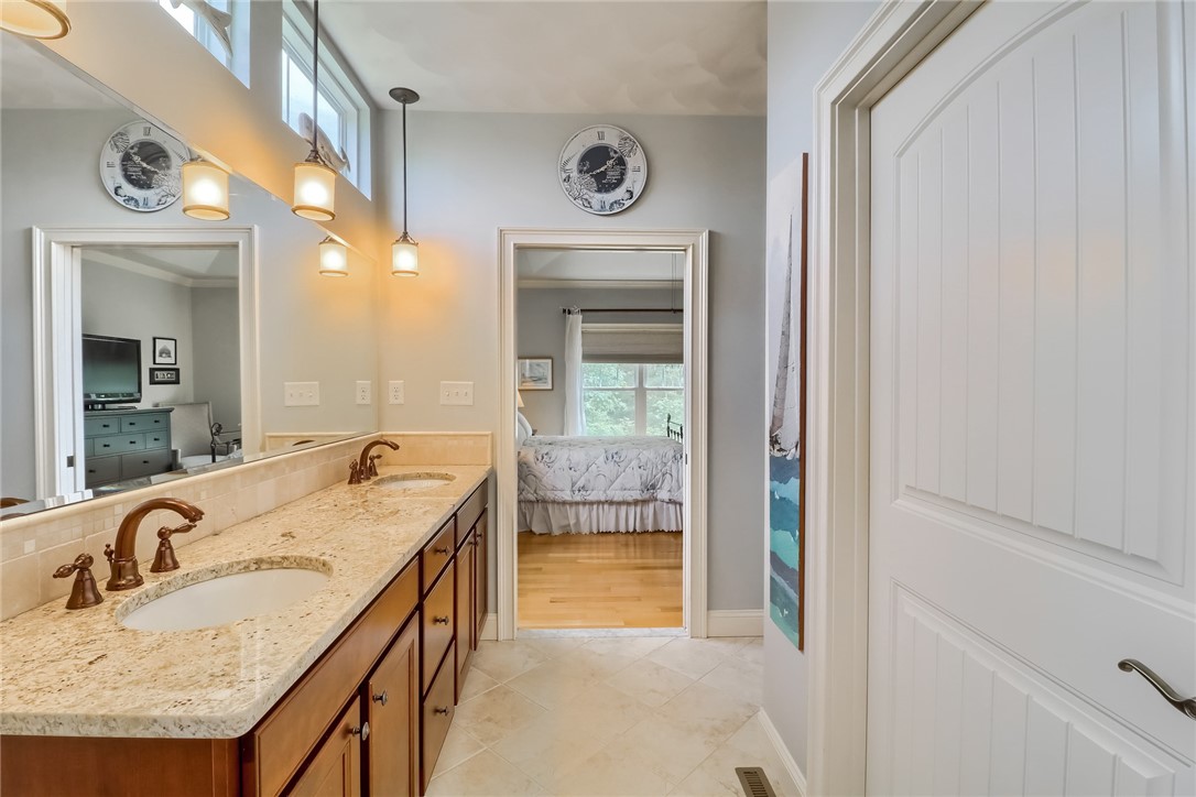 70 Whispering Pine Way, Unit 70 Exeter, RI 02822 - Photo 14 of 21 Main Bath with door to the bedroom