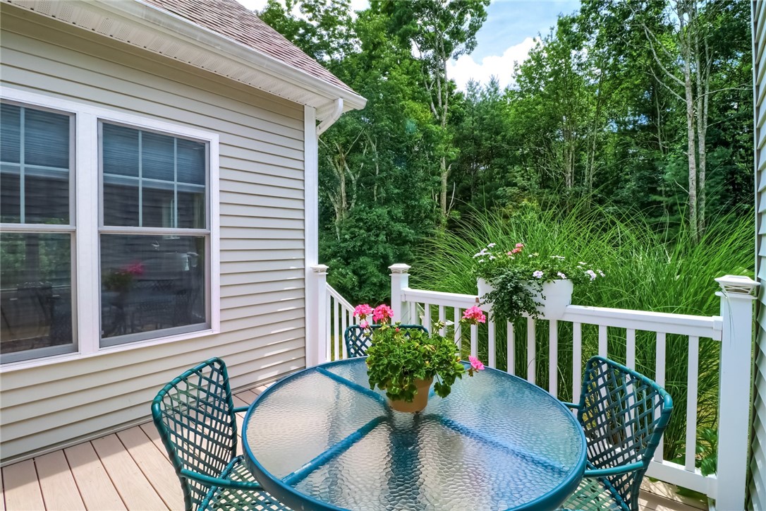 70 Whispering Pine Way, Unit 70 Exeter, RI 02822 - Photo 19 of 21 Deck overlooking back yard