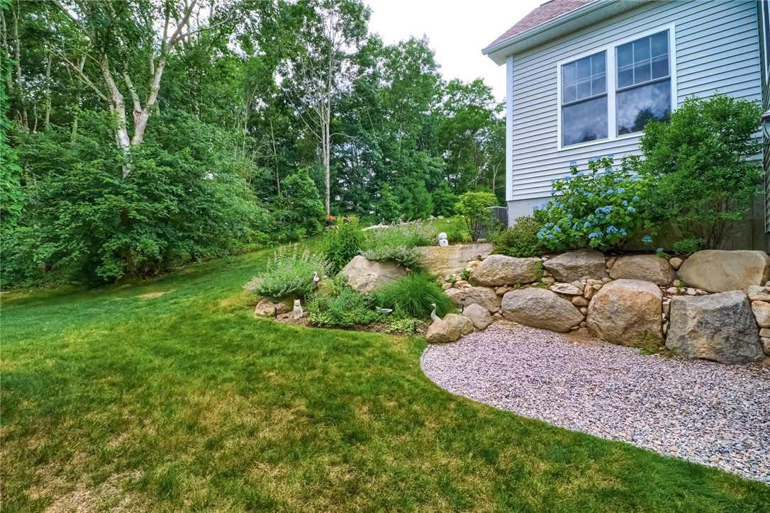 70 Whispering Pine Way, Unit 70 Exeter, RI 02822 - Photo 20 of 21 Back garden