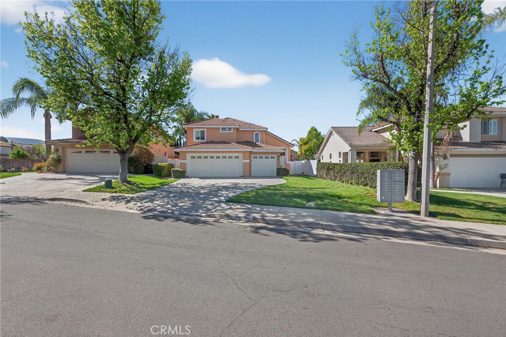 44797 Corte Sanchez Temecula, CA 92592 - Photo 1 of 58 a view of a house with a small yard and large tree