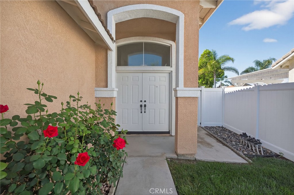 44797 Corte Sanchez Temecula, CA 92592 - Photo 2 of 58 a front view of a house with a yard