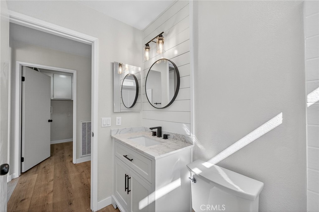 44797 Corte Sanchez Temecula, CA 92592 - Photo 22 of 58 a bathroom with a sink and a mirror
