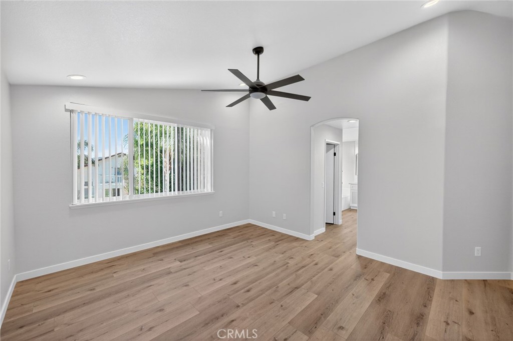 44797 Corte Sanchez Temecula, CA 92592 - Photo 35 of 58 wooden floor in an empty room with a window