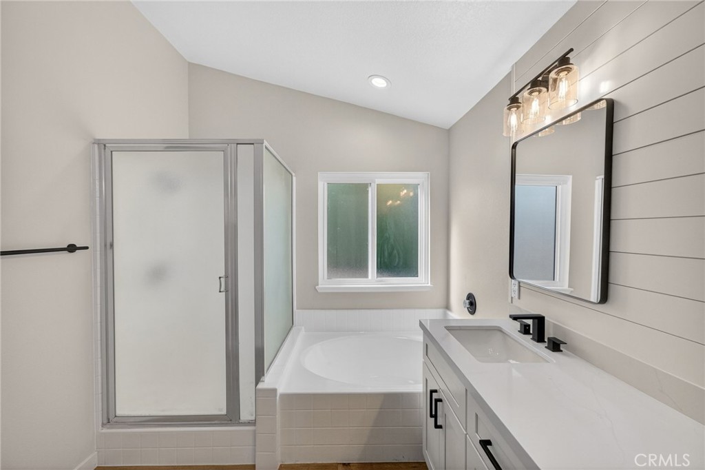 44797 Corte Sanchez Temecula, CA 92592 - Photo 40 of 58 a bathroom with a sink and a mirror