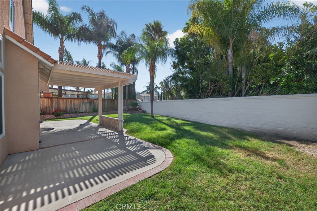 44797 Corte Sanchez Temecula, CA 92592 - Photo 47 of 58 a view of a backyard with a garden and plants