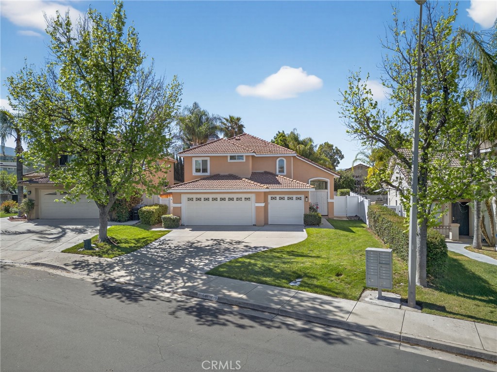 44797 Corte Sanchez Temecula, CA 92592 - Photo 50 of 58 a front view of a house with a yard and garage