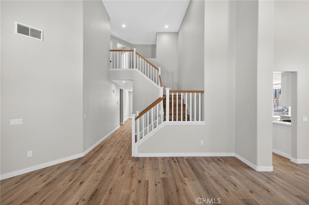 44797 Corte Sanchez Temecula, CA 92592 - Photo 7 of 58 a view of entryway with wooden floor