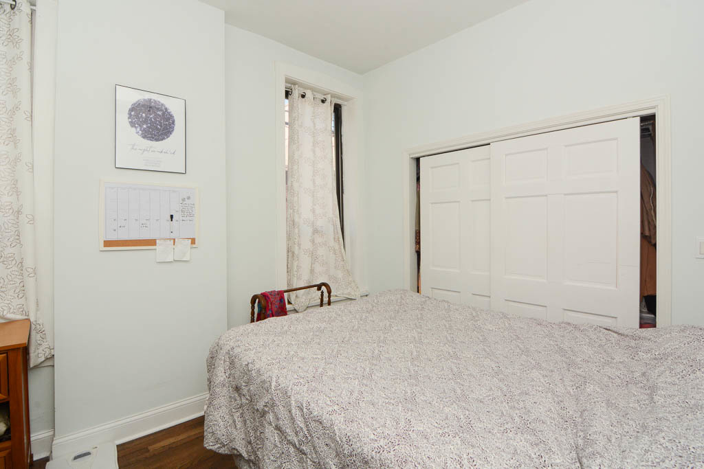 2347 West 24th Place, Unit 1R Chicago, IL 60608 - Photo 12 of 21 a bedroom with a bed and a closet