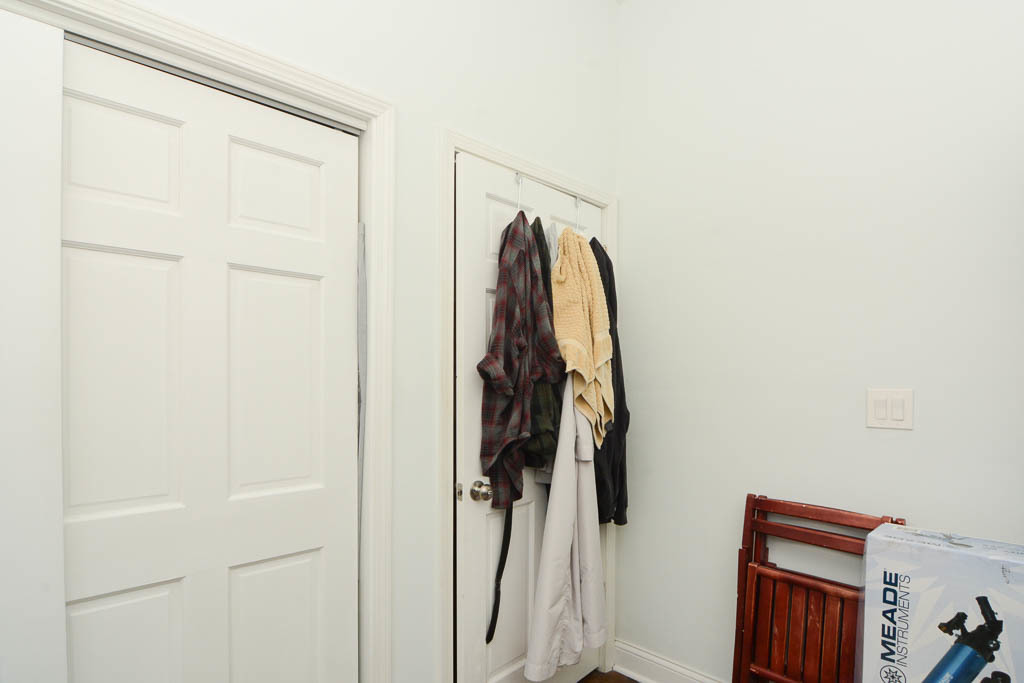 2347 West 24th Place, Unit 1R Chicago, IL 60608 - Photo 19 of 21 a view of walk in closet with clothes