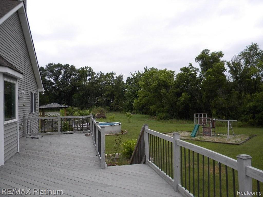 5321 Bradley Road Gregory, MI 48137 - Photo 34 of 35 View of Pool and Play Set