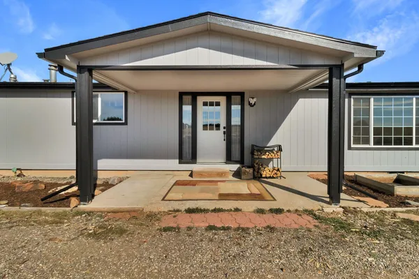 a house view with a outdoor space